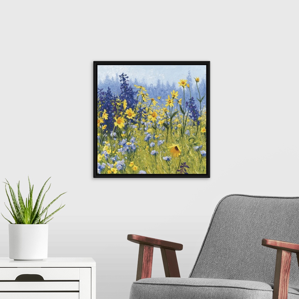 A modern room featuring Contemporary painting of a field of wildflowers with blue, green, purple, and yellow hues.