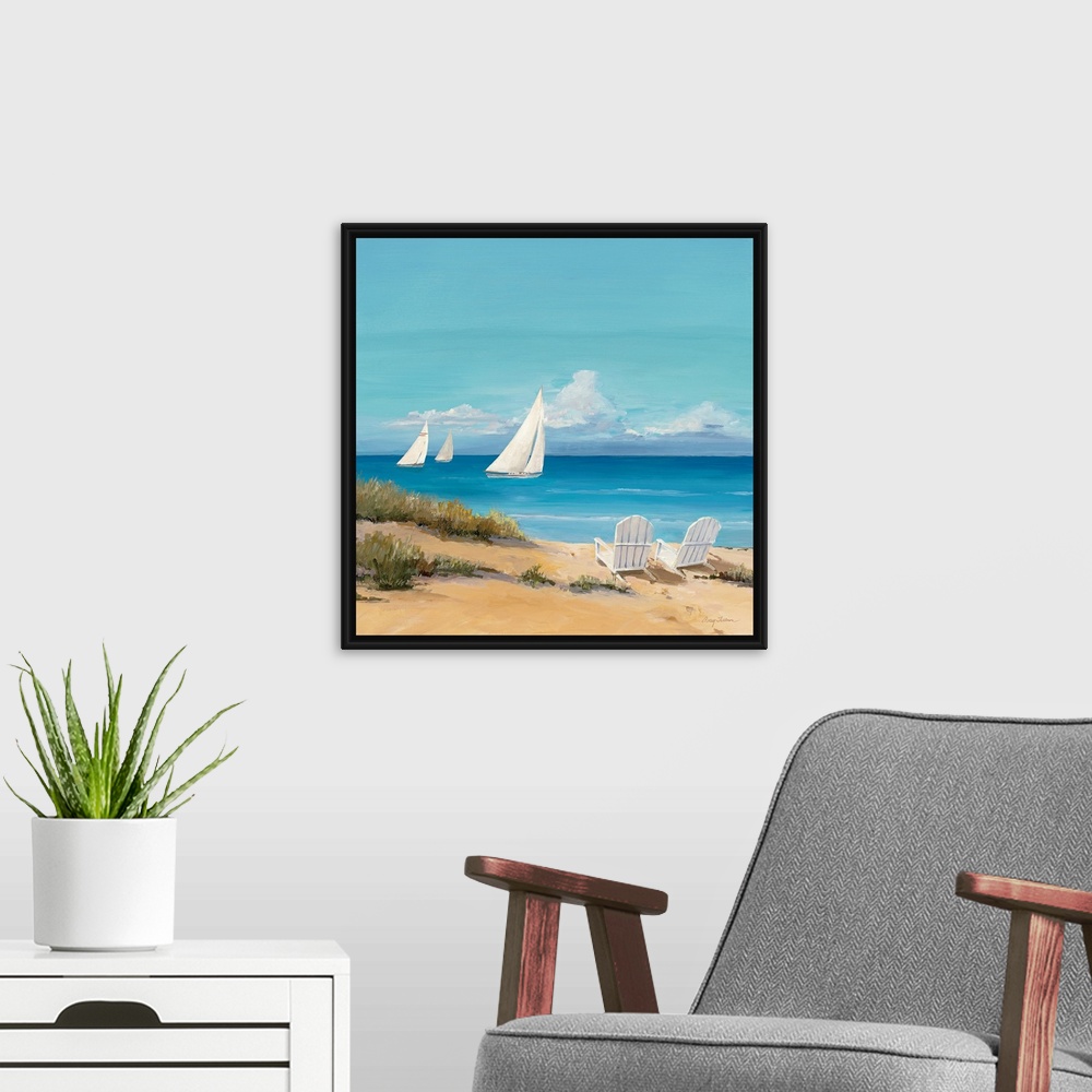 A modern room featuring Large contemporary art shows a trio of sailboats traveling through the open waters of an ocean on...