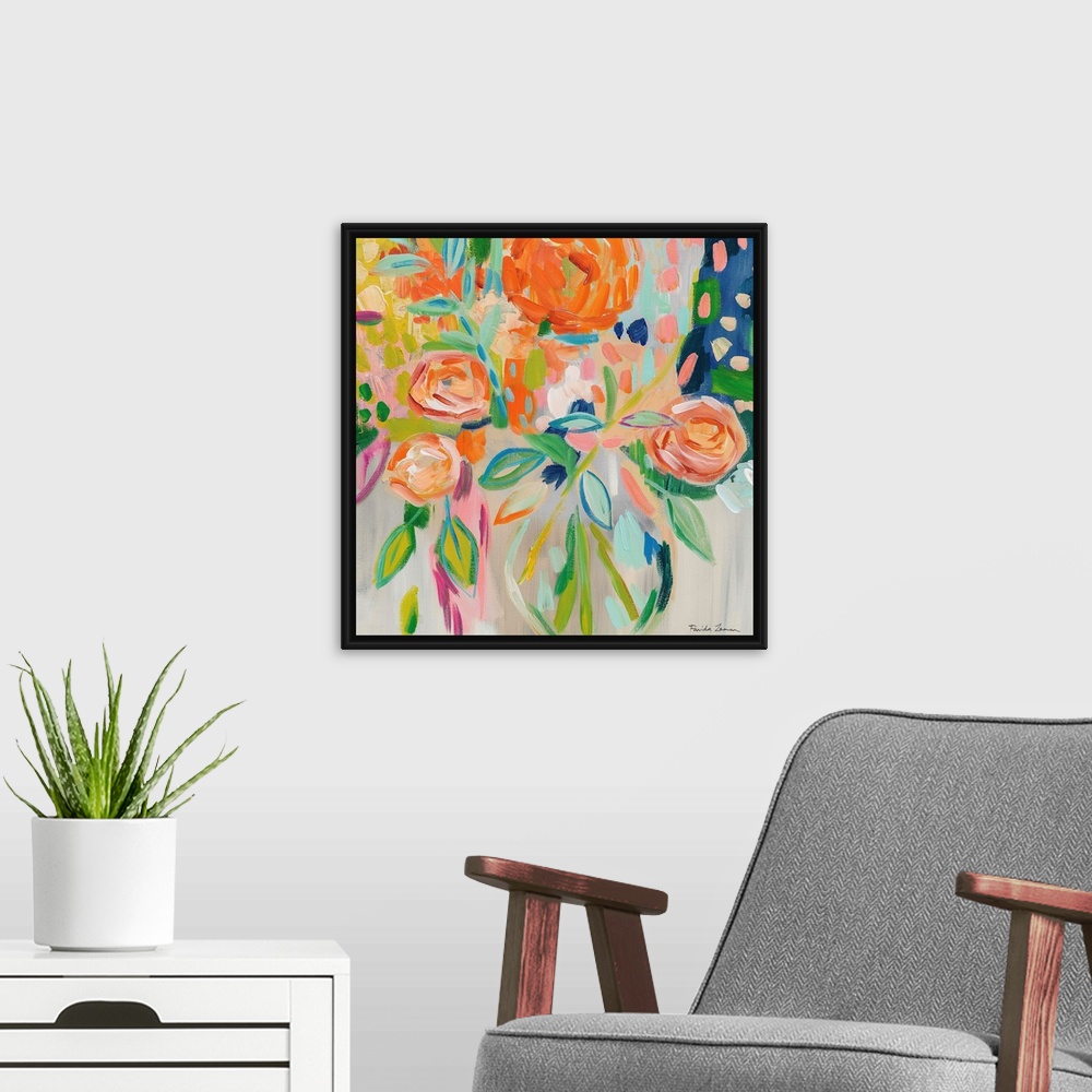 A modern room featuring Abstract square painting of a bouquet of flowers in bold shades of orange.
