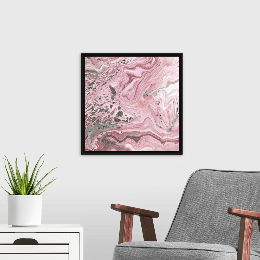 A modern room featuring Square abstract decor with marbling colors of pink, gray, and white.