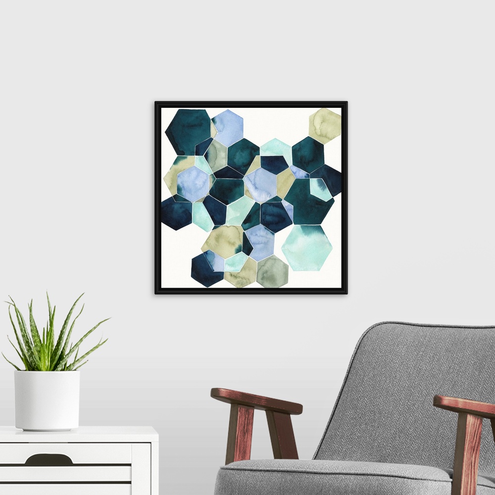 A modern room featuring Watercolor geometric painting of intersecting hexagons in blue tones.