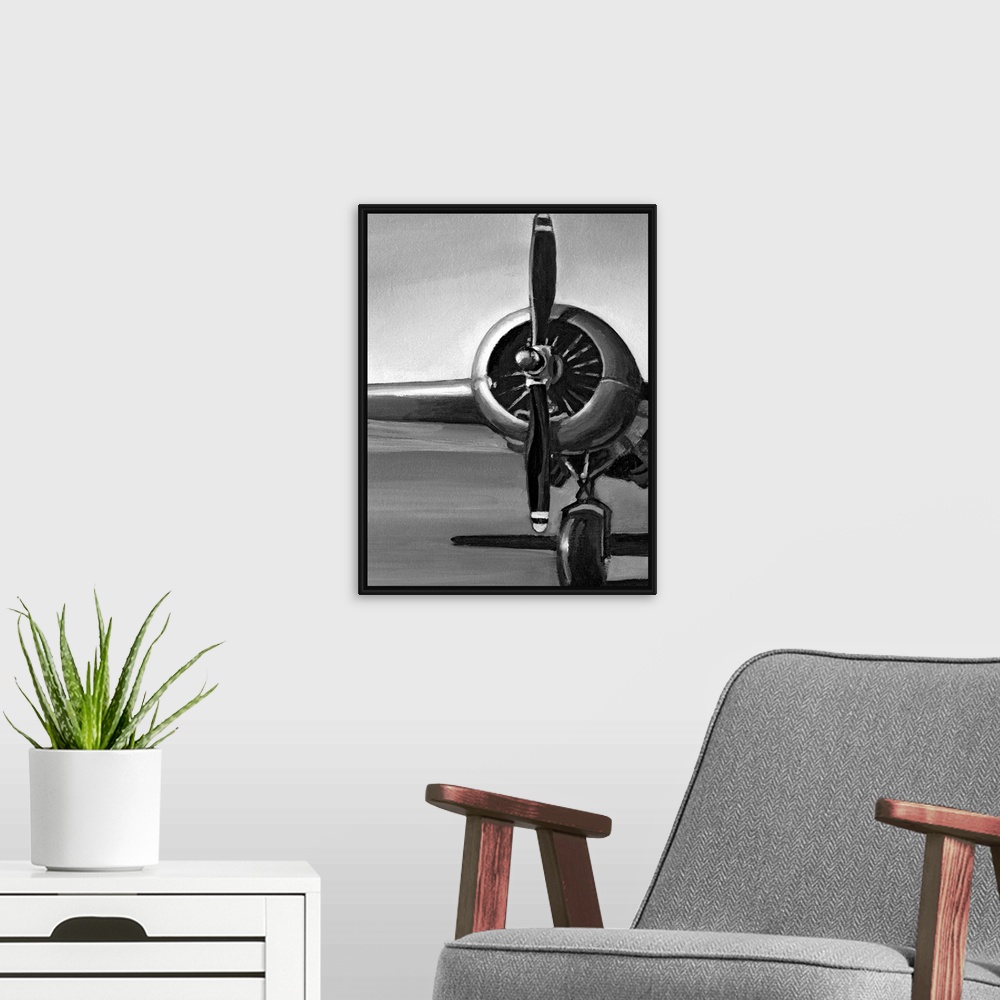 A modern room featuring Vertical, oversized artwork of a wing, propeller and wheel on a vintage airplane, casting a shado...