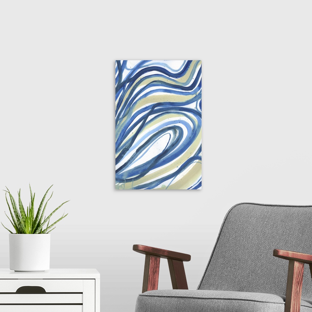 A modern room featuring abstract painting using blues and greens in swirling wave like patterns.