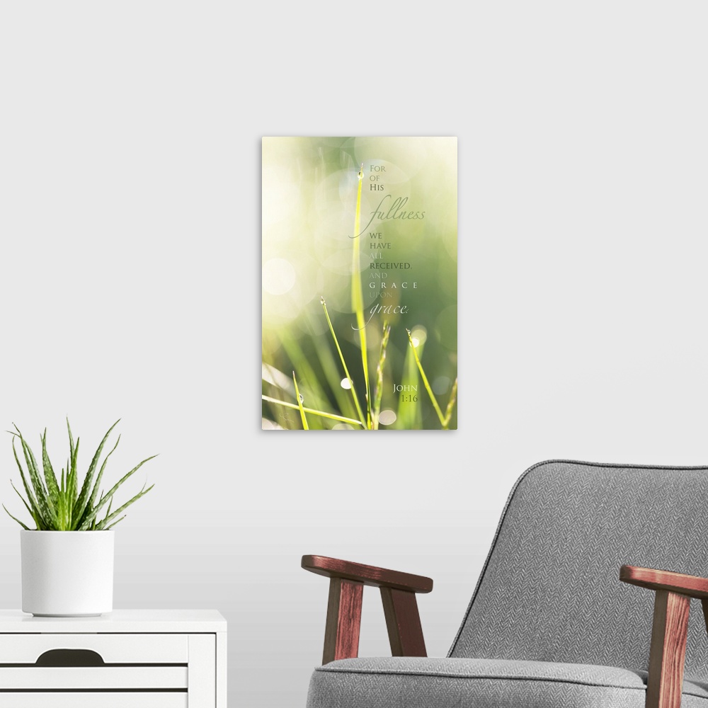 A modern room featuring Inspirational artwork with a Bible verse from John 1:16 with a background of dew drops on grass