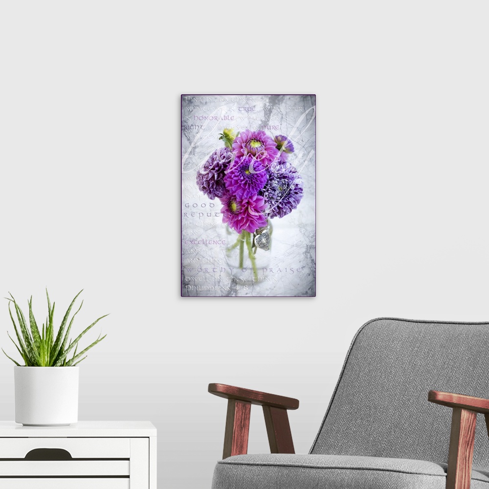 A modern room featuring Marbled purple dahlia's arranged in a glass jar with Philippians 4:8 written in the background, a...