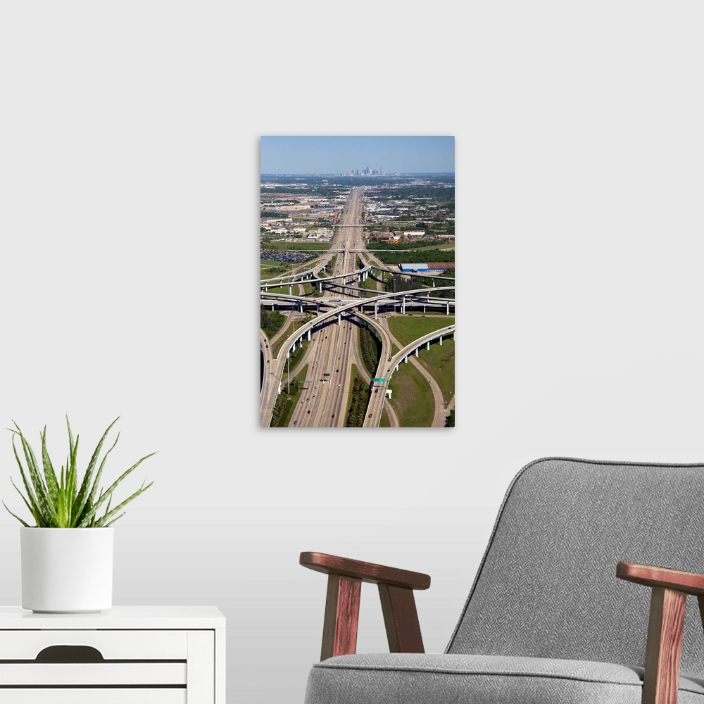 A modern room featuring Aerial view of the freeway interchange of Interstate 45 and the State Highway Beltway 8 in Housto...