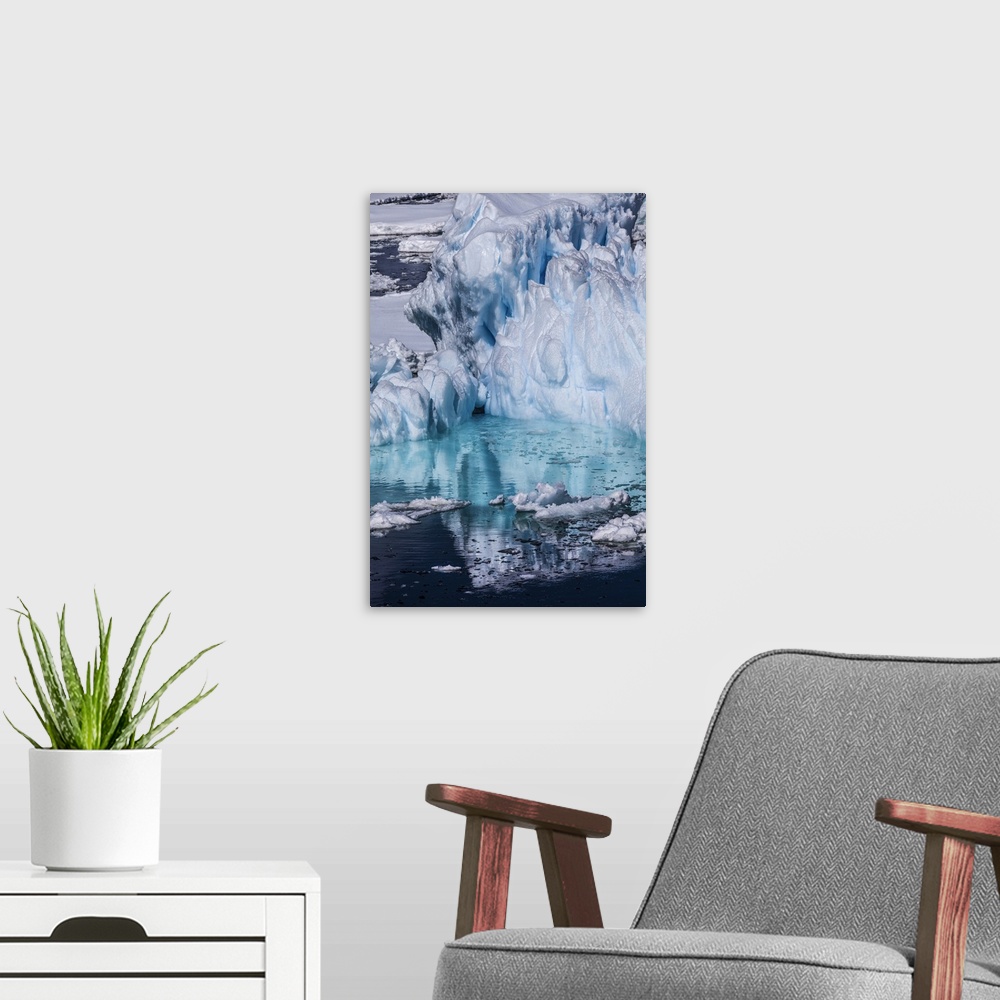 A modern room featuring Antarctica. Colorful Iceberg and Sea Ice.
