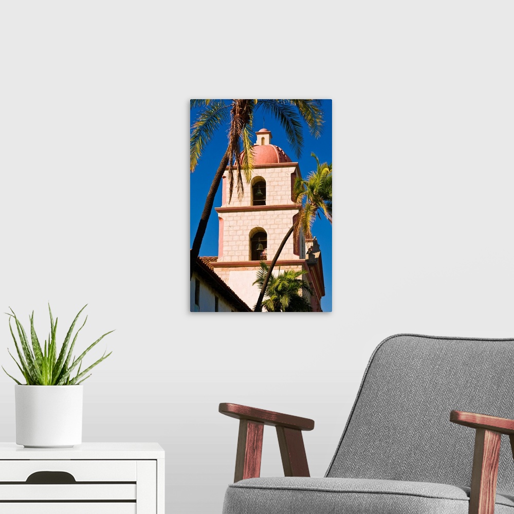 A modern room featuring Bell tower and palms at the Santa Barbara Mission (Queen of the missions), Santa Barbara, Califor...