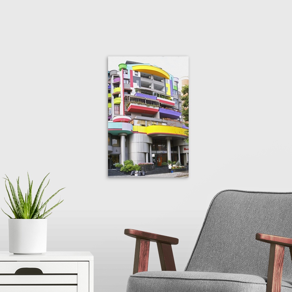 A modern room featuring A very colourful building. Street scene from the part of the city called The Block that used to b...