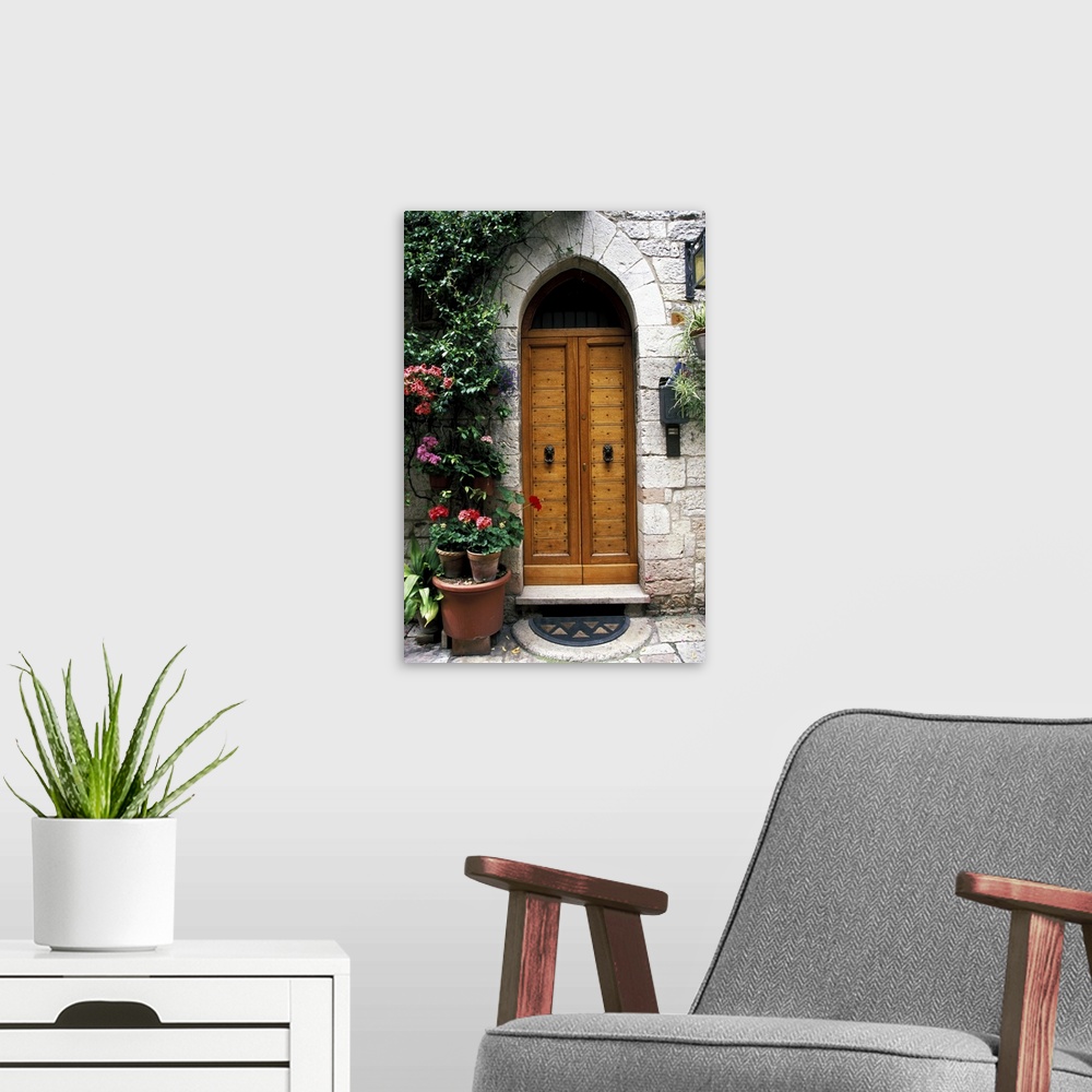 A modern room featuring Europe, Italy, Umbria, Assisi. Medieval village door.