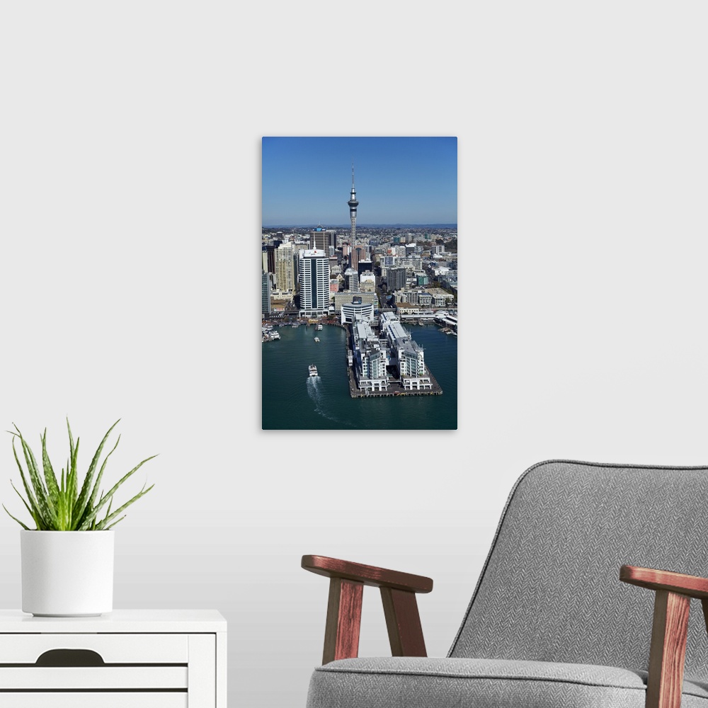 A modern room featuring Hotel, Sky Tower, and Auckland waterfront, Auckland, North Island, New Zealand.