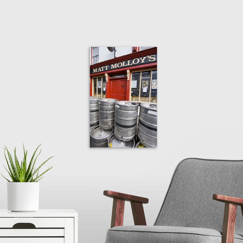 A modern room featuring County Mayo, Ireland, Westport, pub, keg, beer, Guiness