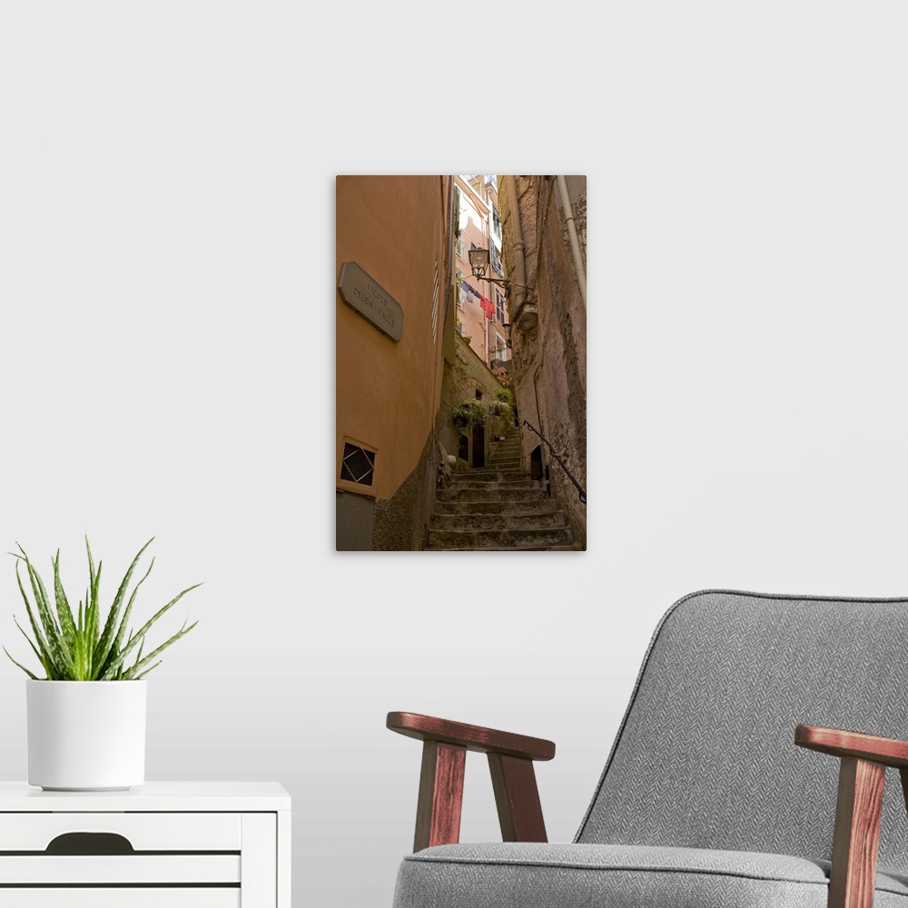 A modern room featuring Europe, Italy, Cinque Terre, Riomaggiore. Steep steps between buildings.