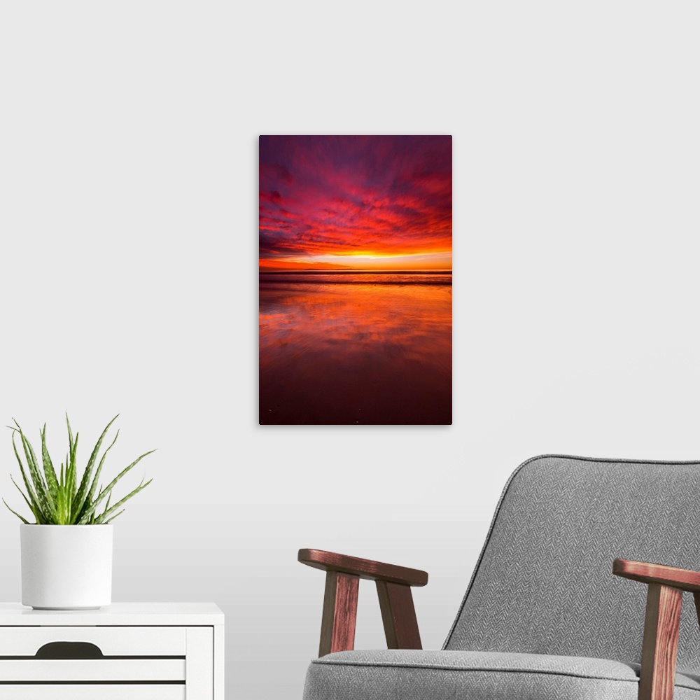 A modern room featuring Sunset over the Channel Islands from Ventura State Beach, Ventura, California USA.