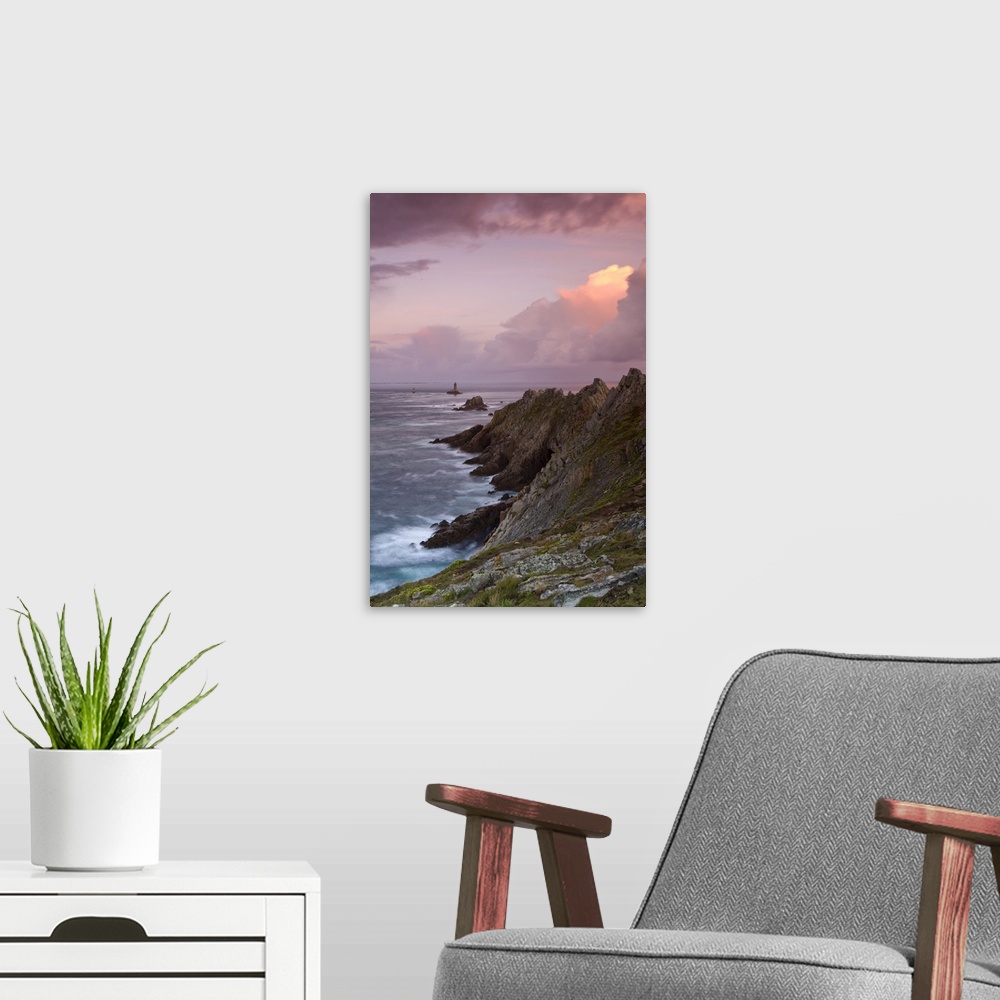 A modern room featuring France, Brittany, Dusk descends over the La Vieille lighthouse