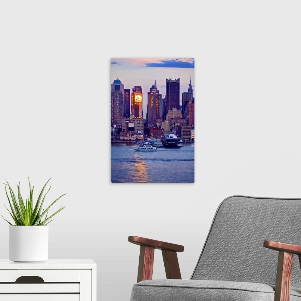 A modern room featuring New York, New York City, Manhattan, midtown skyline, viewed from New Jersey