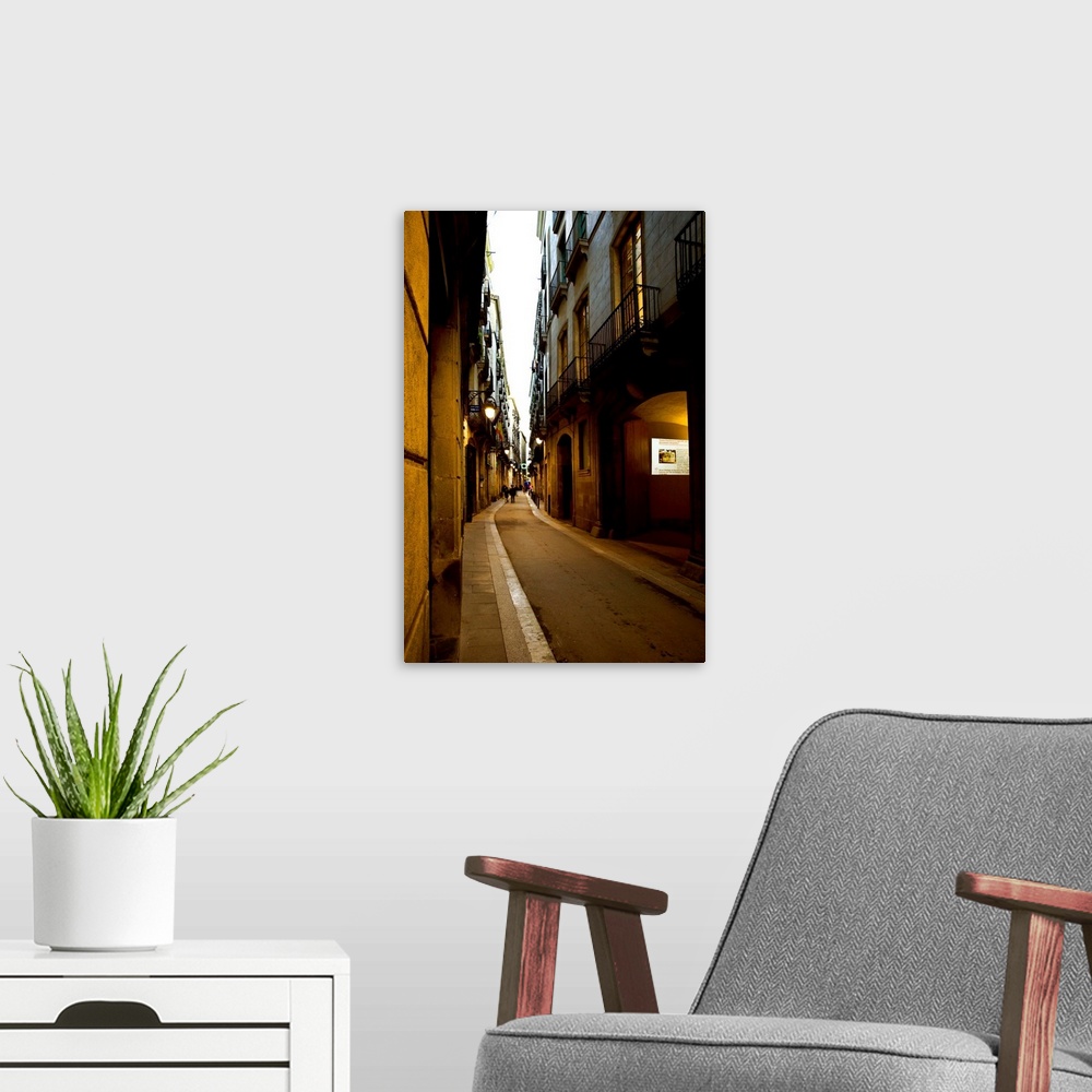 A modern room featuring Spain, Barcelona, Gothic Quarter off La Rambla, Narrow Pedestrian Street.