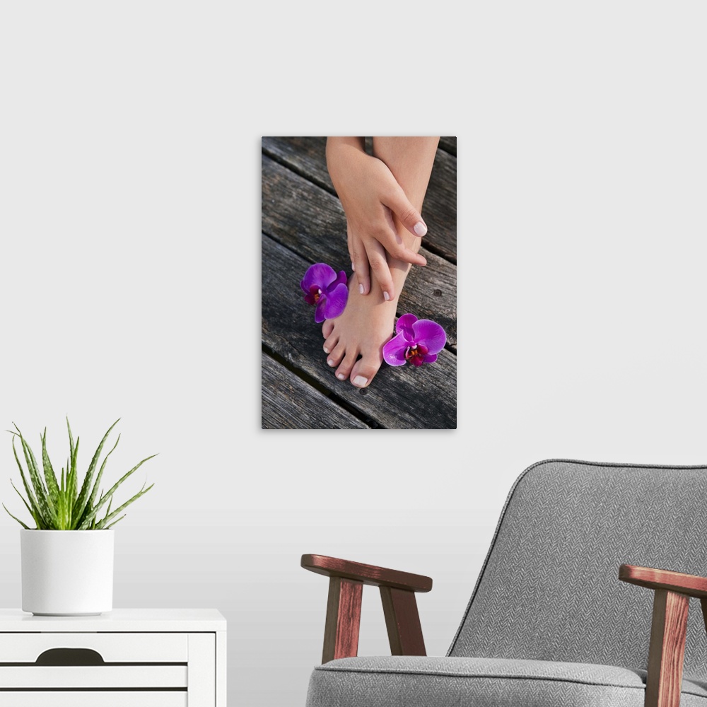 A modern room featuring Close up of womans foot with flowers