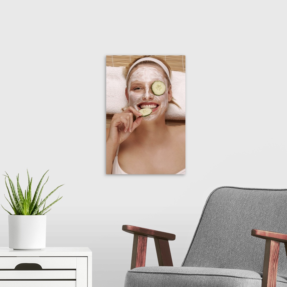 A modern room featuring A young woman with a face pack.