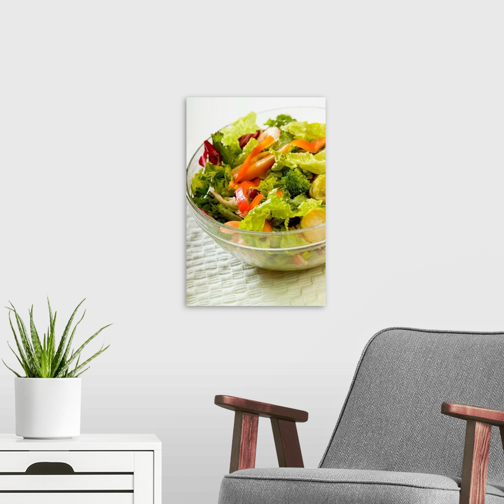 A modern room featuring Bowl of salad, close-up, part of