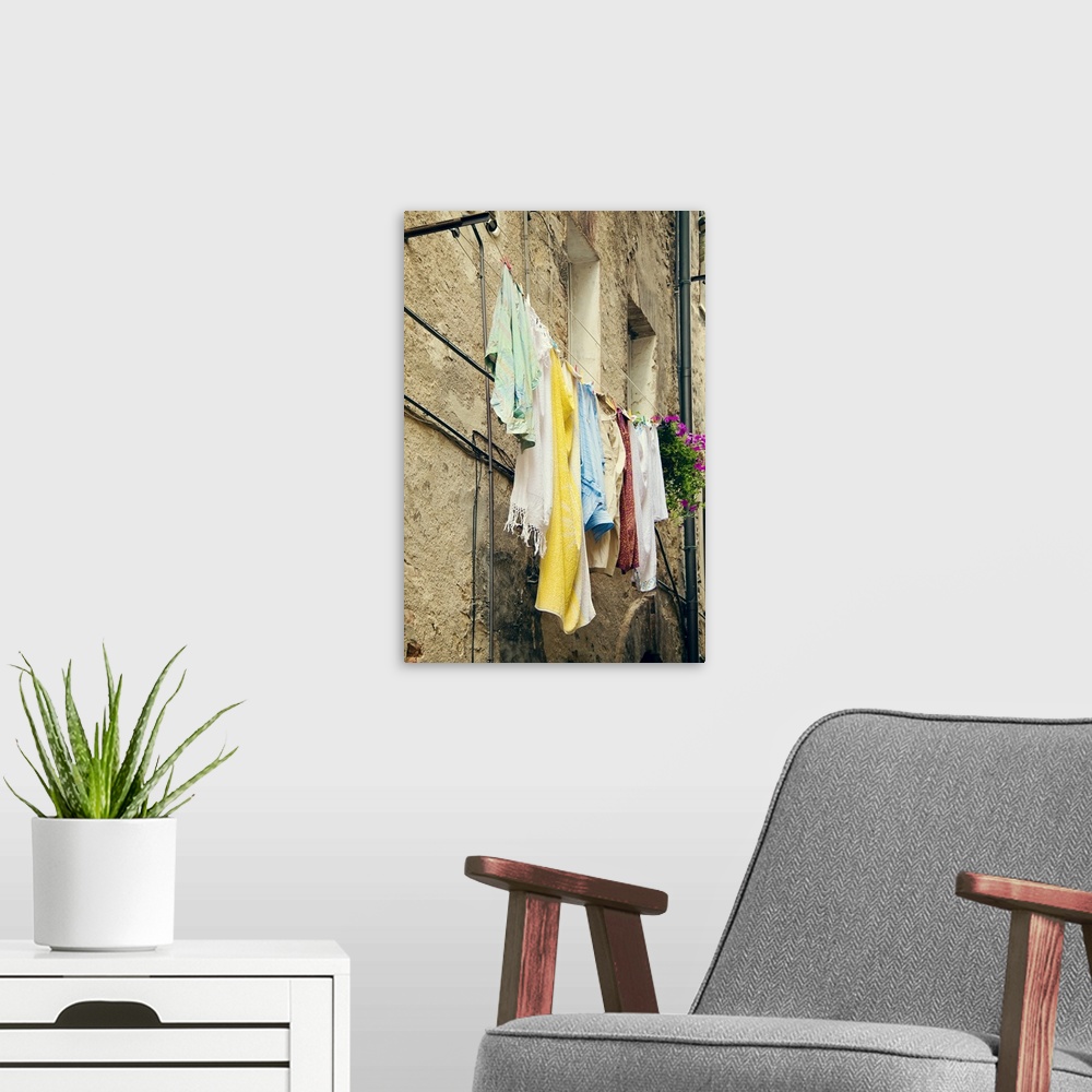 A modern room featuring Laundry hanging from a window, Italy