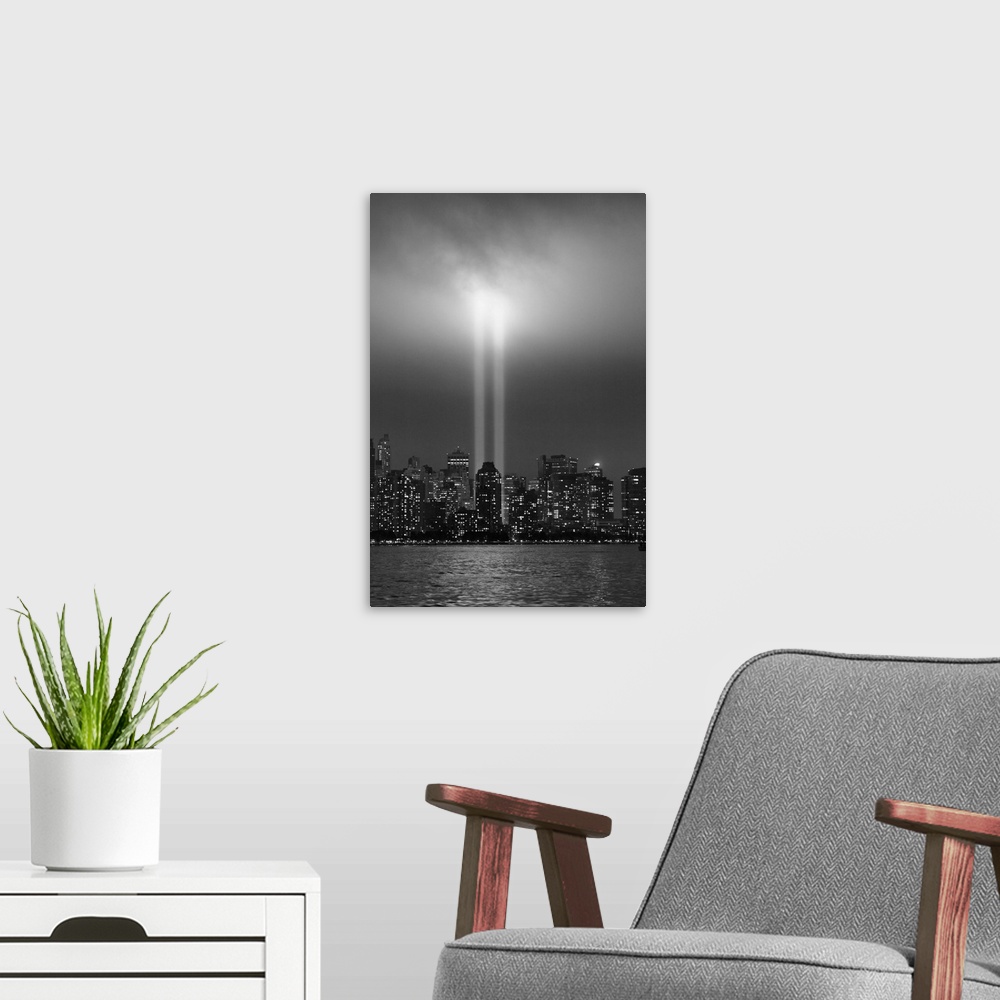 A modern room featuring USA, New York City, Manhattan skyline with 9/11 memorial lights