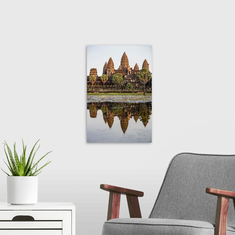 A modern room featuring Cambodia, Angkor Wat, Siem Reap Province. The magnificent Khmer temple of Angkor Wat bathed in la...