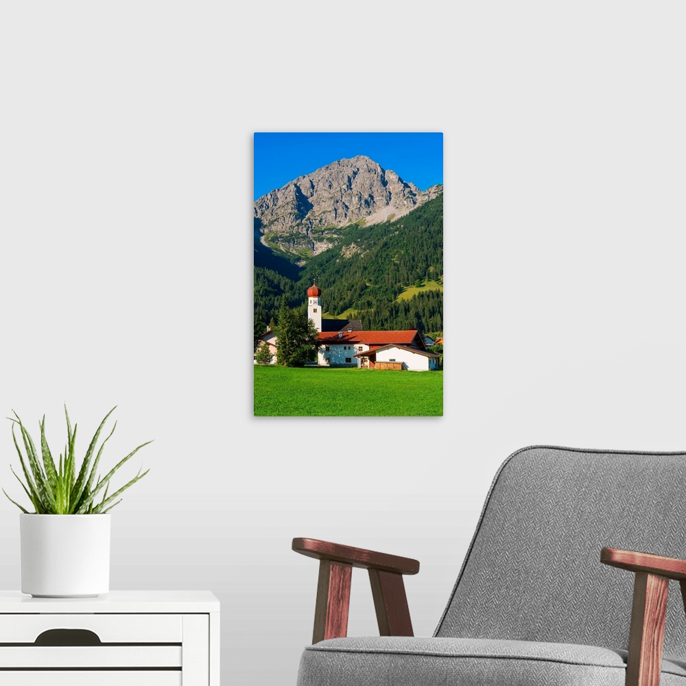 A modern room featuring Heiterwang with Thaneller mountain, Tyrol, Austria.