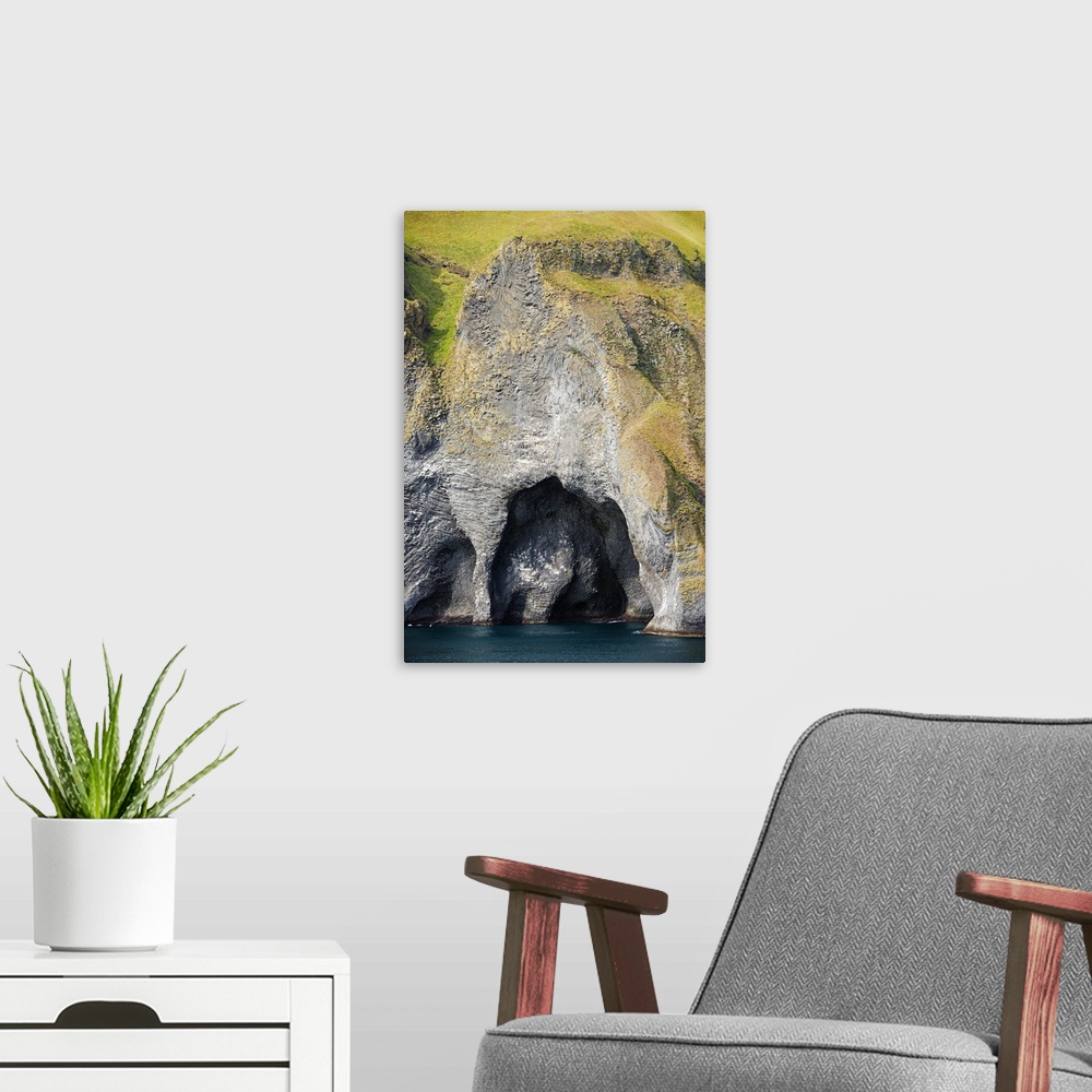 A modern room featuring Iceland, Vestmannaeyjar, volcanic Westman Islands, Heimaey Island, coastal cliffs.