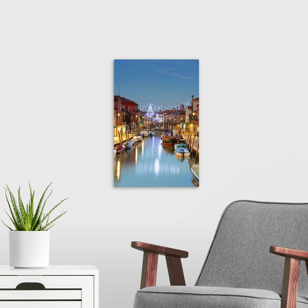 A modern room featuring Europe, Italy, Veneto, Venice, Murano, Christmas decoration on a canal.