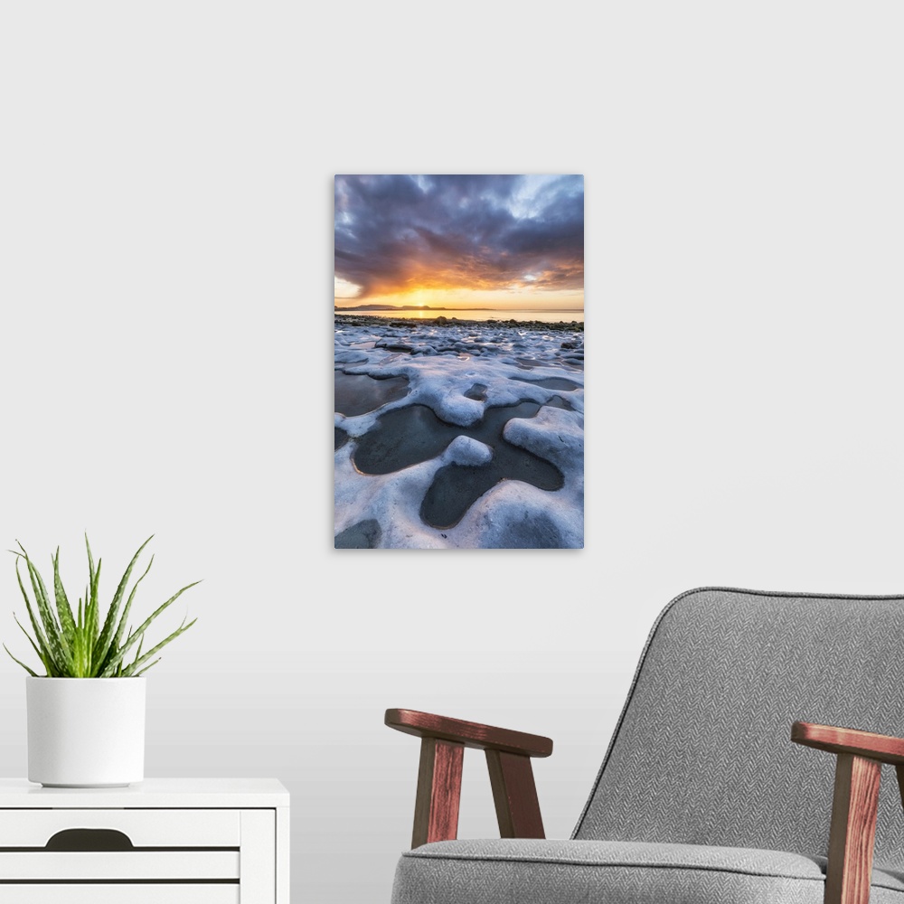 A modern room featuring Sunrise from Monmouth Beach, Lyme Regis, Jurassic Coast World Heritage Site, Dorset, England, UK.