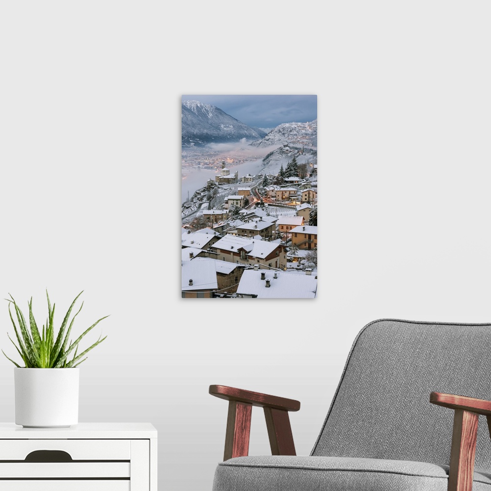 A modern room featuring Poggiridenti after snowfall, Province of Sondrio, Valtellina, Lombardy, Italy
