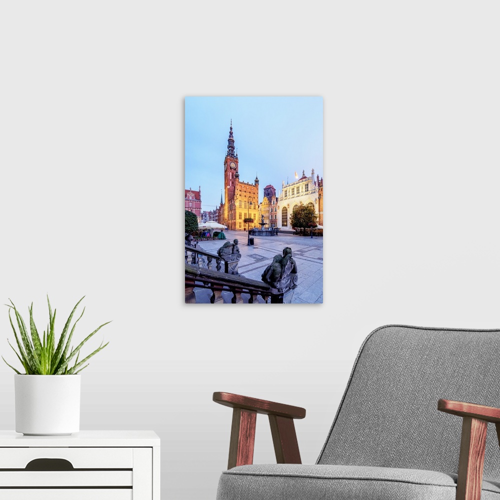 A modern room featuring Poland, Pomeranian Voivodeship, Gdansk, Old Town, Twilight view of Long Market and City Hall.