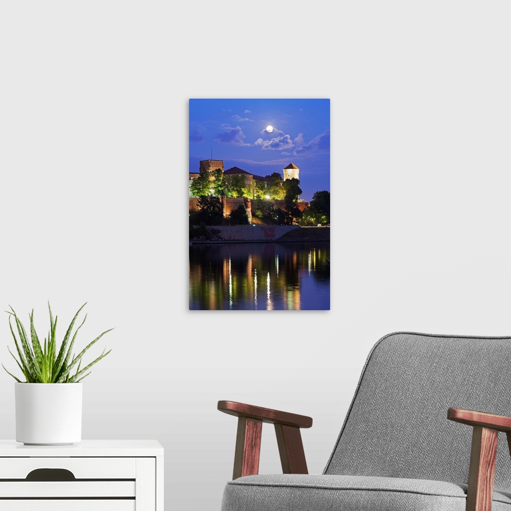 A modern room featuring Europe, Poland, Malopolska, Krakow, full moon over Wawel Hill Castle and Cathedral, Vistula River...