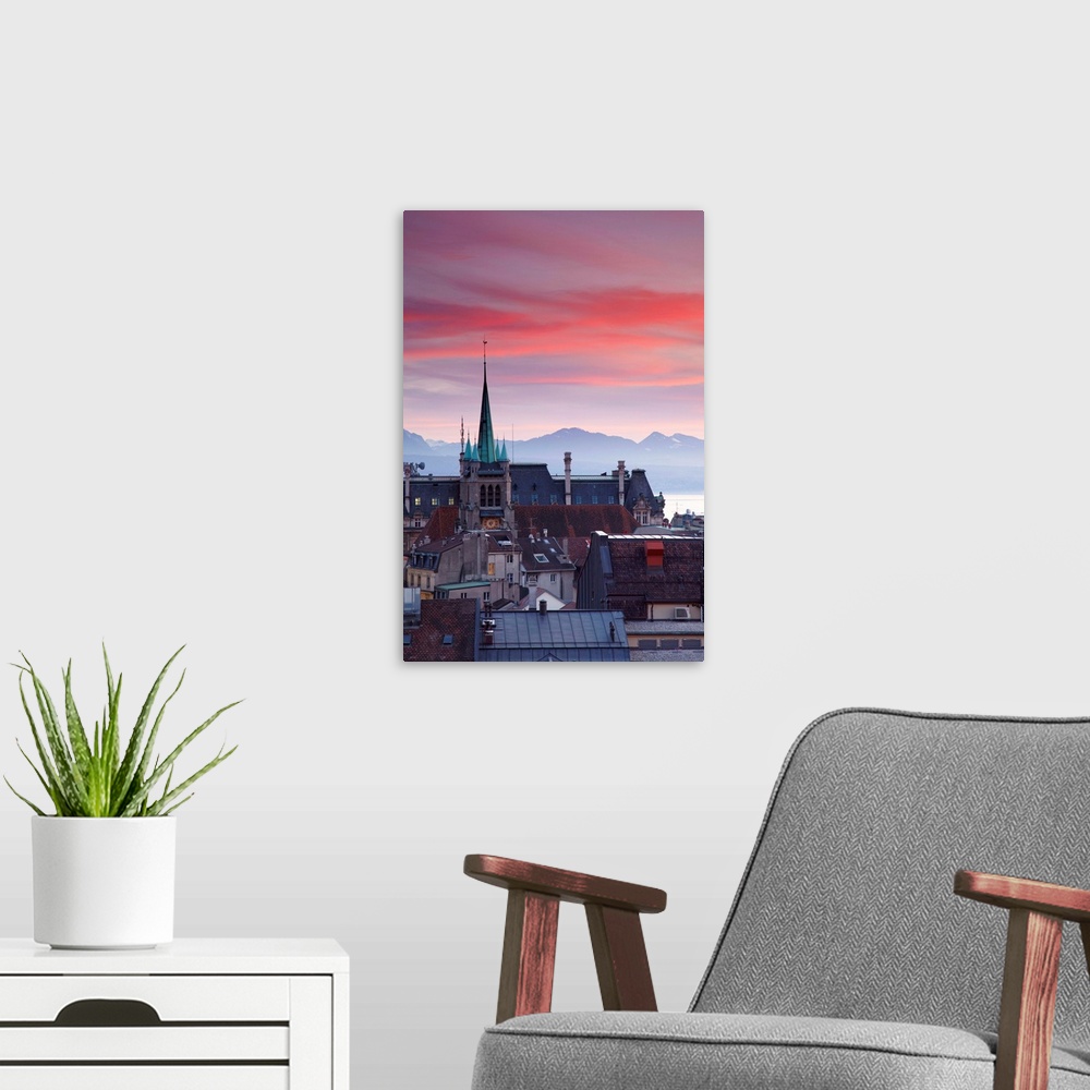 A modern room featuring St Francois Church and city skyline at dusk, Lausanne, Vaud, Switzerland