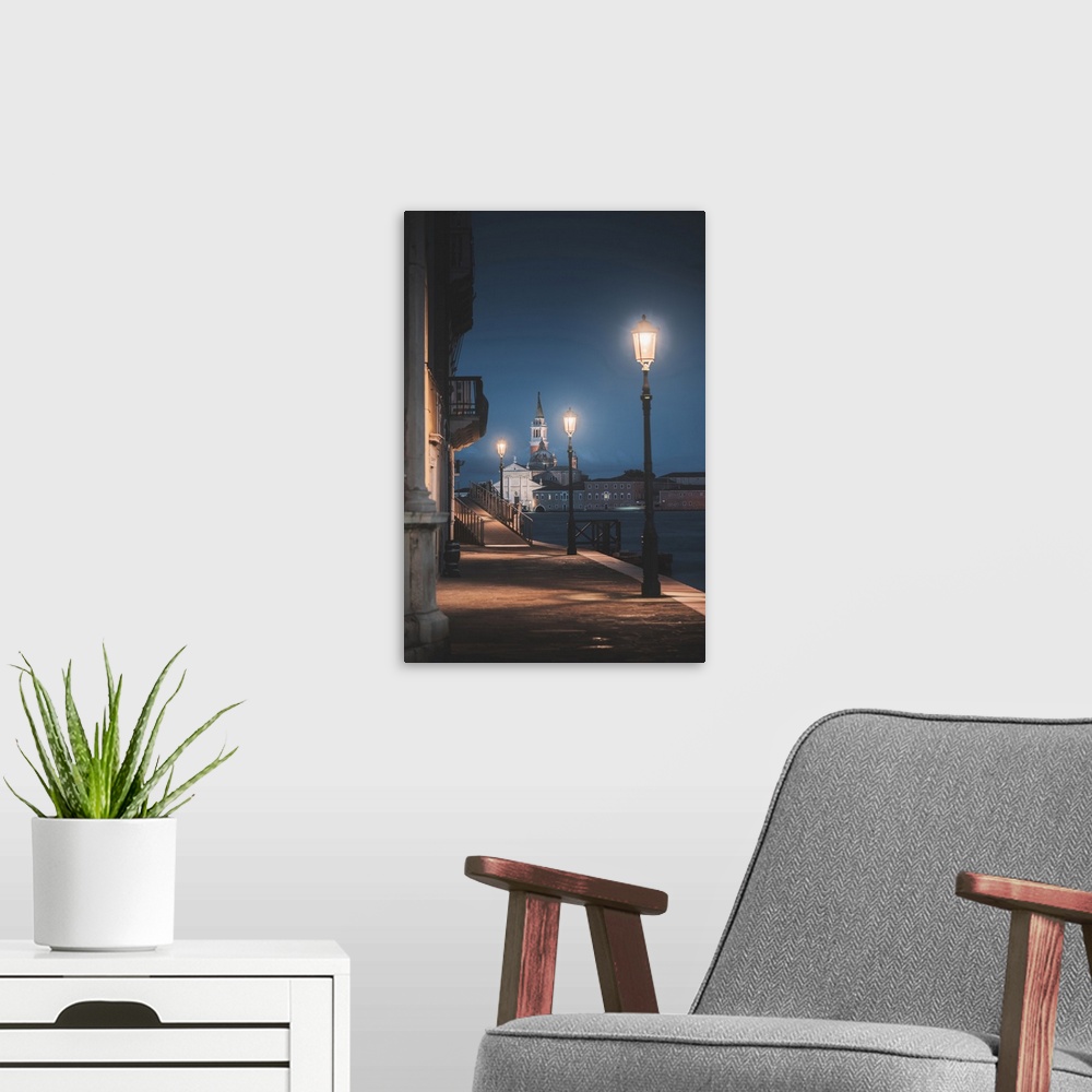 A modern room featuring Venice, Veneto, Italy. Riverside alley in Dorsoduro and San Giorgio church in the background at d...