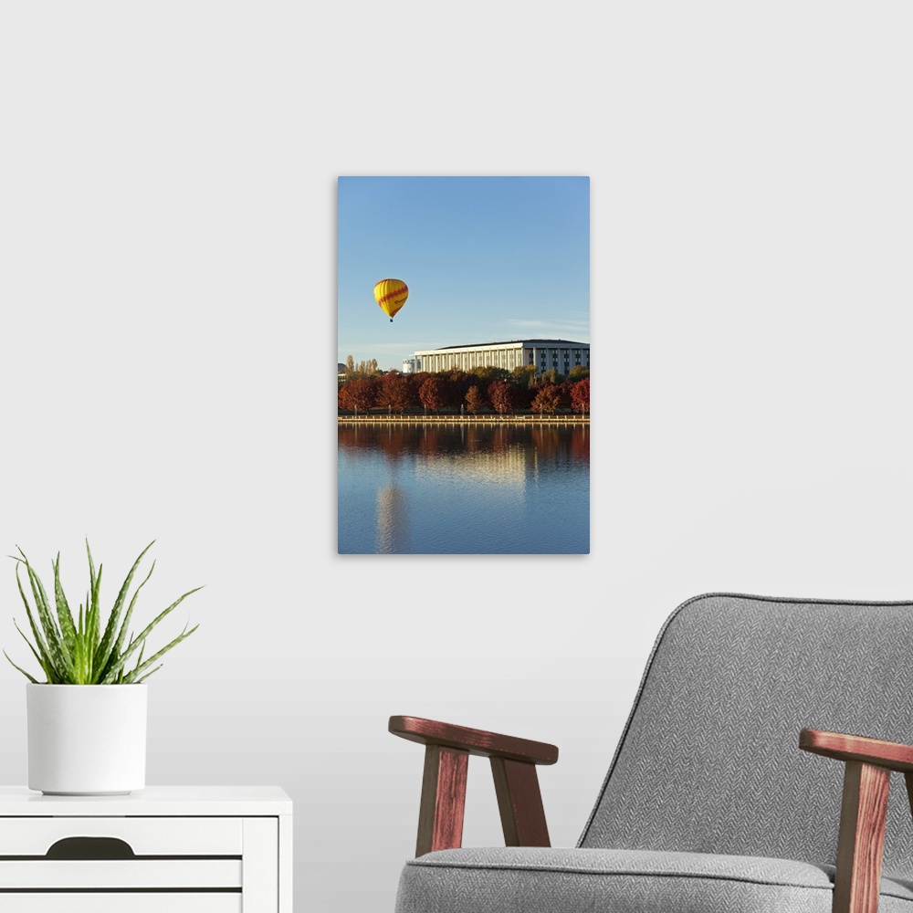 A modern room featuring Australia, Australian Capital Territory (ACT), Canberra. View across Lake Burley Griffin to hot a...