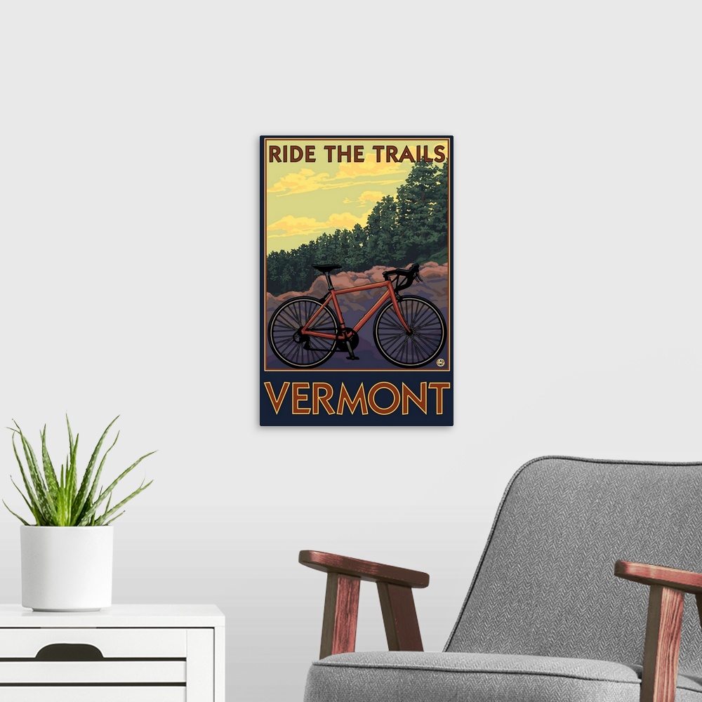 A modern room featuring Retro stylized art poster of a mountain bike, with a dense lush forest in the background.