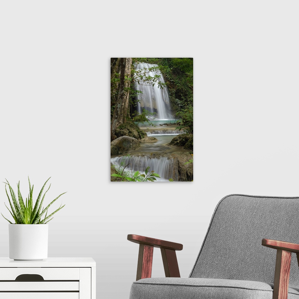 A modern room featuring Seven Step Waterfall in monsoon forest, Erawan National Park, Thailand