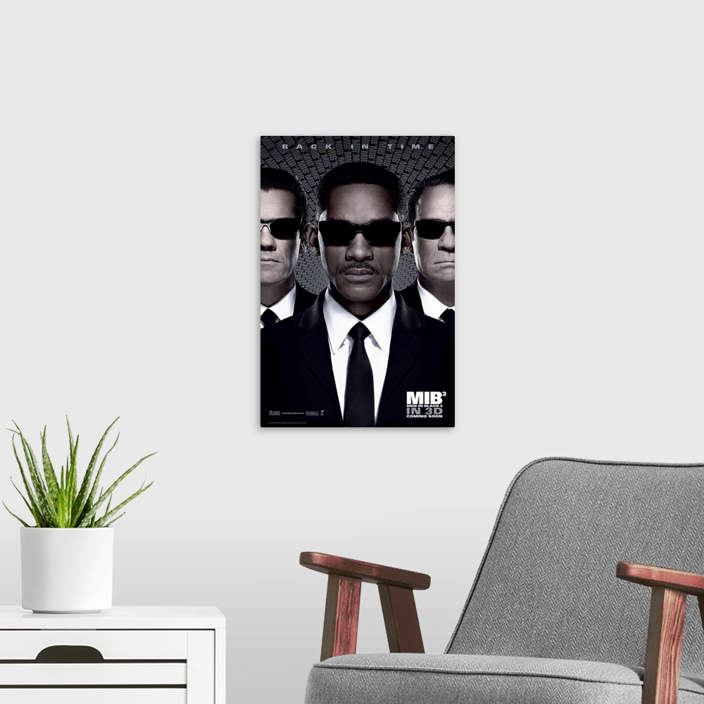 A modern room featuring Men in Black 3 - Movie Poster