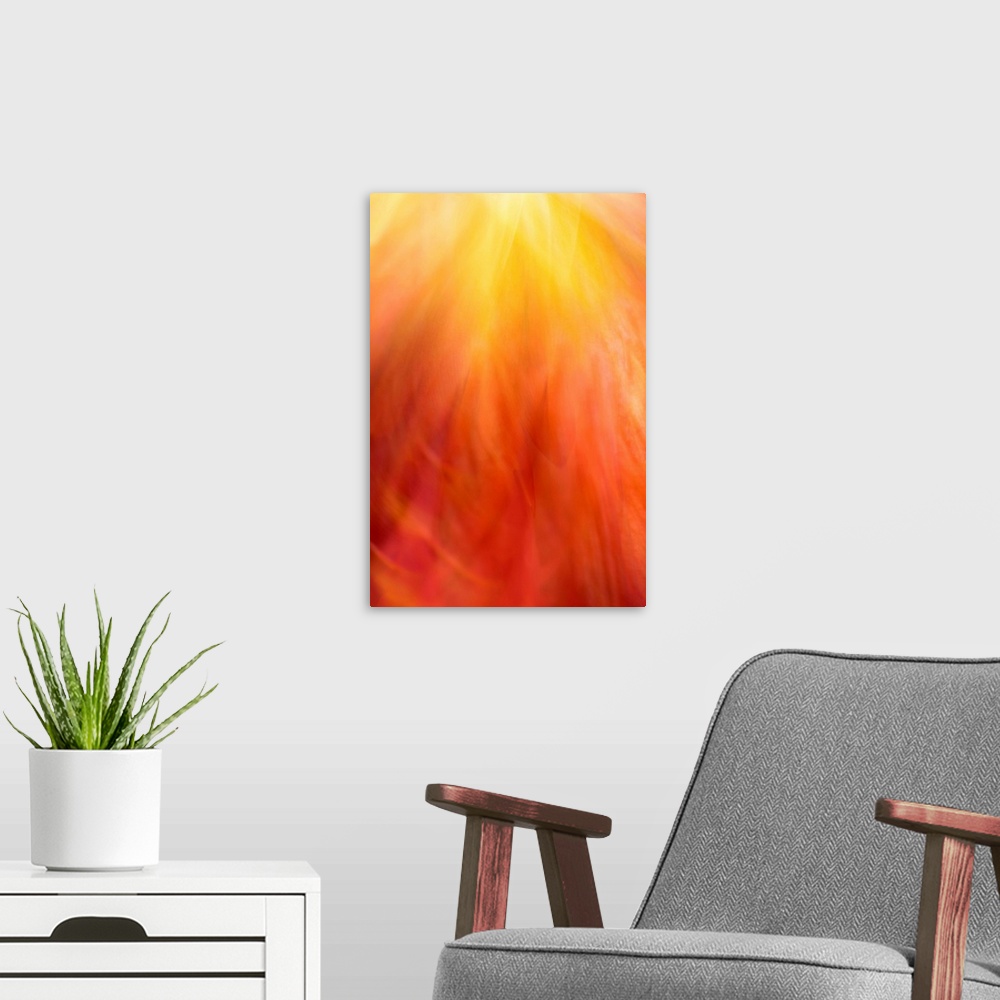 A modern room featuring A contemporary golden orange energetic abstract of swirling patterns.