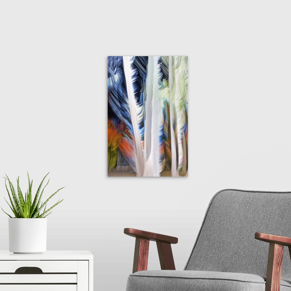 A modern room featuring An ICM (Intentional Camera Movement) image of a group of tall cedars in a small town in British C...