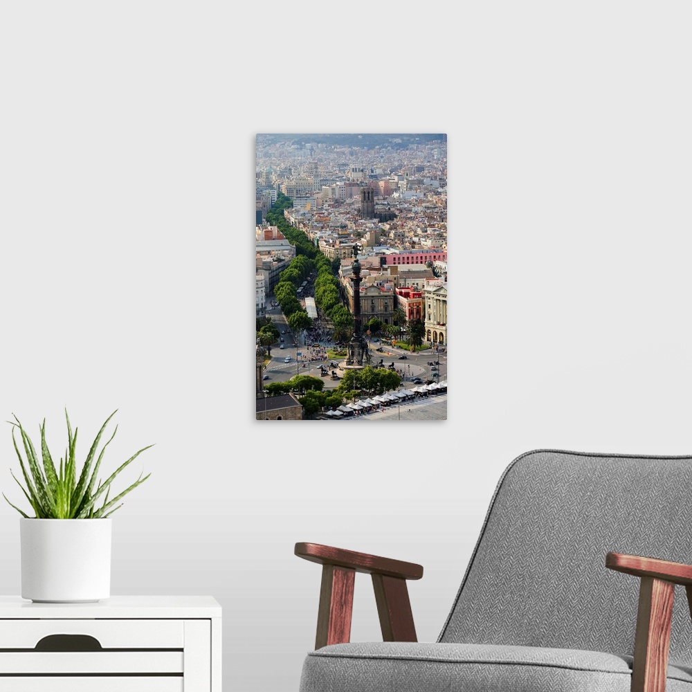 A modern room featuring Aerial view of La Rambla near the waterfront with Columbus statue in Barcelona, Spain