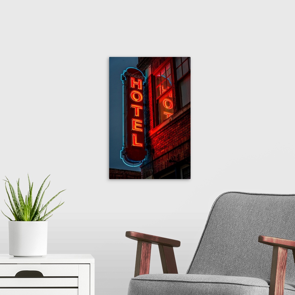 A modern room featuring Neon sign for "hotel" in texas.