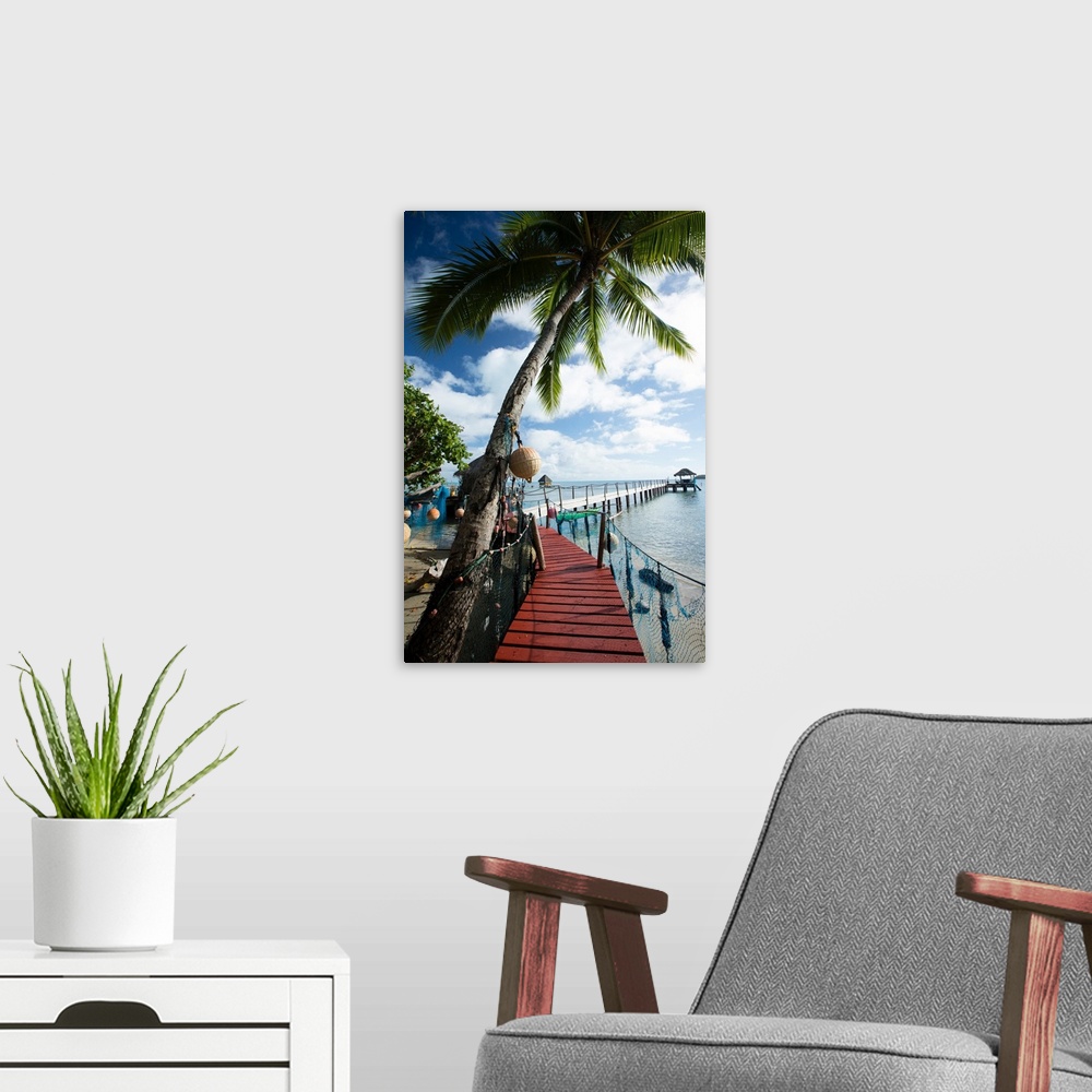 A modern room featuring Palm Trees and dock, Bora Bora, Society Islands, French Polynesia