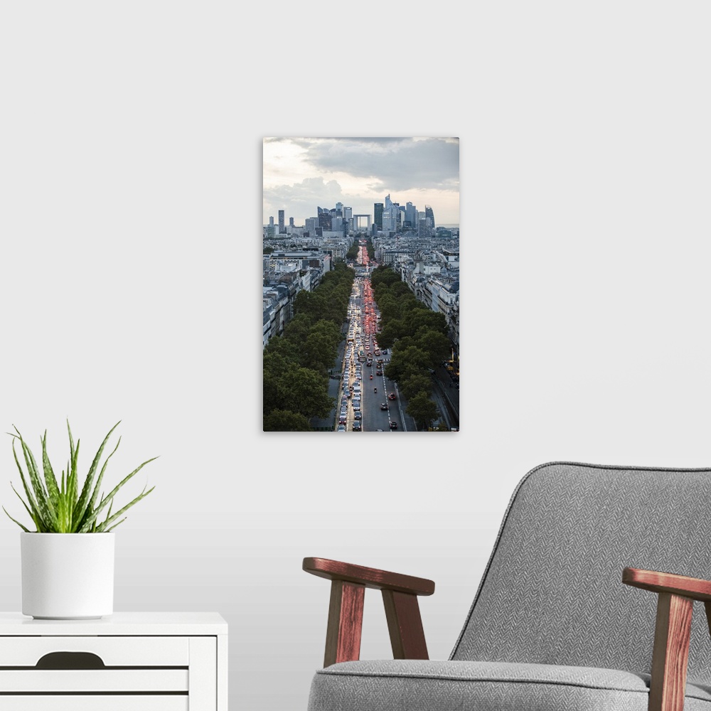 A modern room featuring Aerial photograph of the Paris skyline at rush hour.