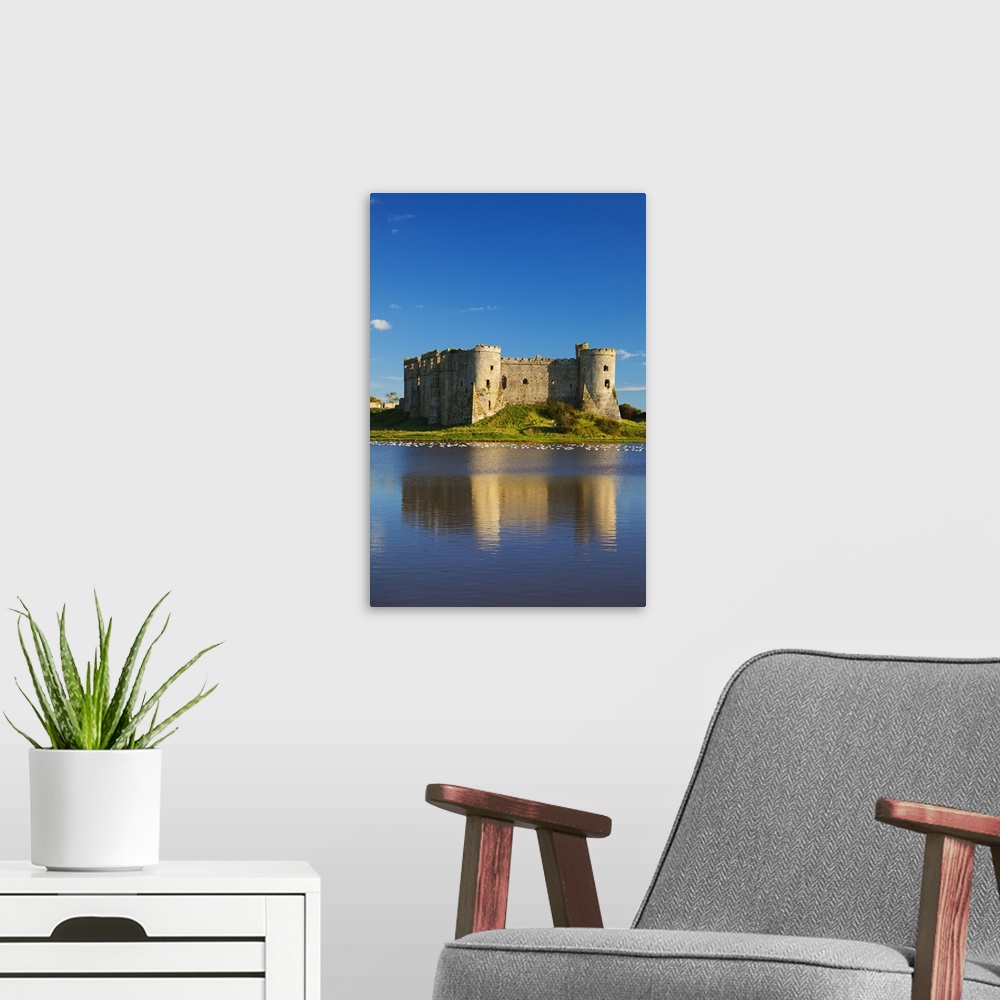 A modern room featuring Carew Castle, Pembrokeshire, West Wales, Wales