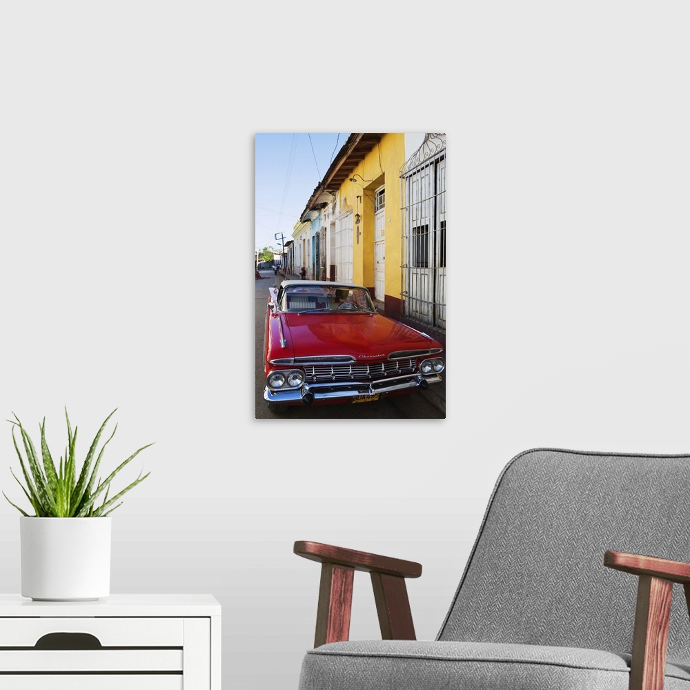 A modern room featuring Chevrolet, classic 1950's American car, Trinidad, Cuba, West Indies