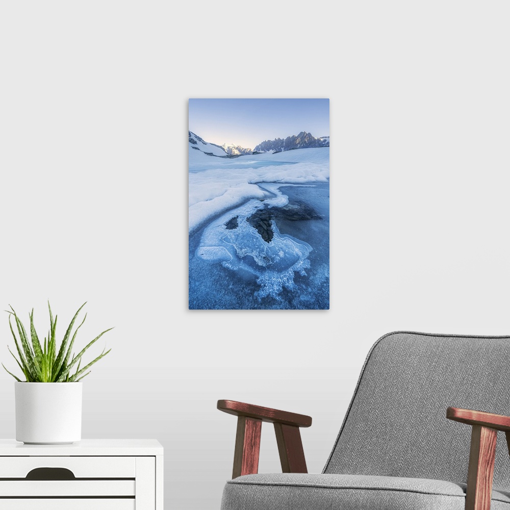 A modern room featuring Icy surface of Forbici Lake due to spring thaw, Valmalenco, Valtellina, Sondrio province, Lombard...