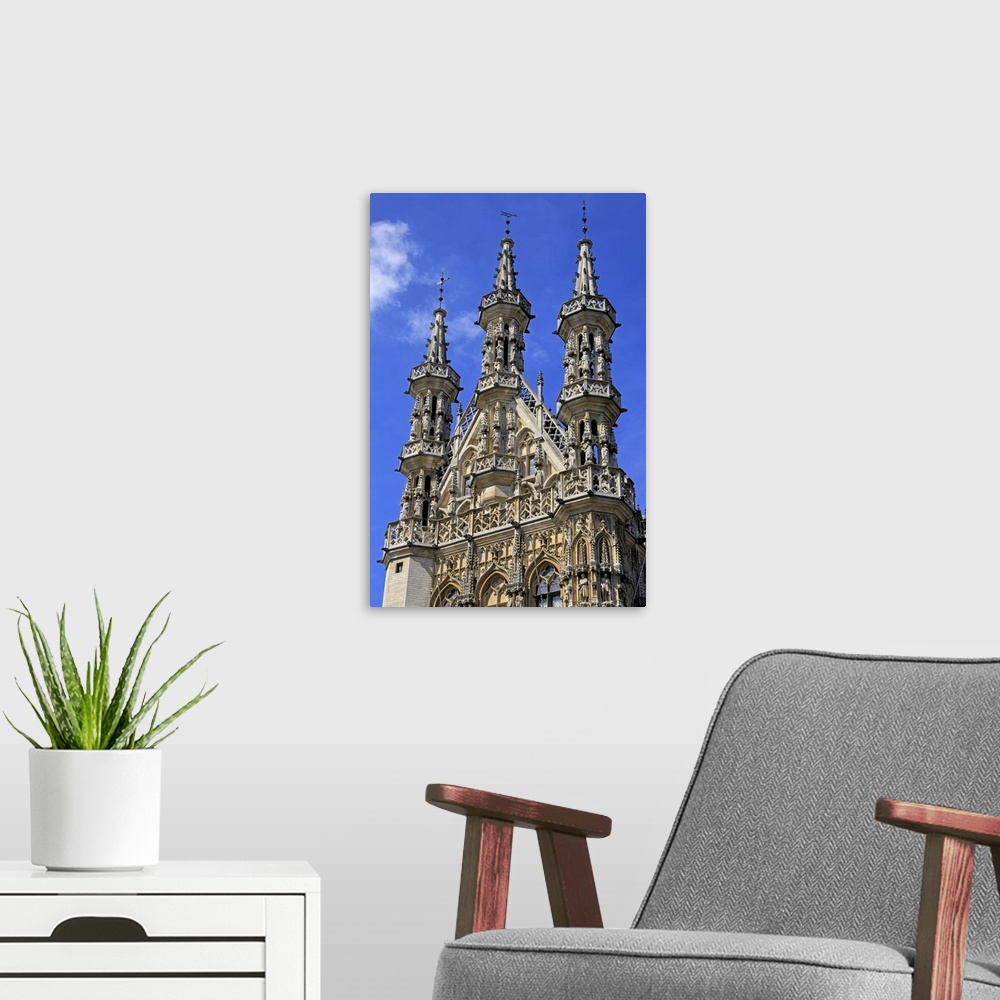 A modern room featuring Late Gothic Town Hall at Grote Markt Square, Leuven, Brabant, Belgium